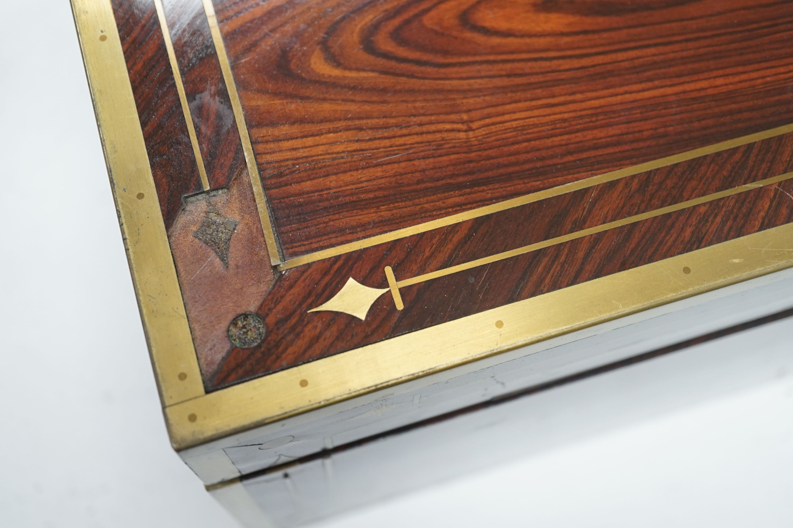 A George IV brass bound kingwood writing slope, 52cm